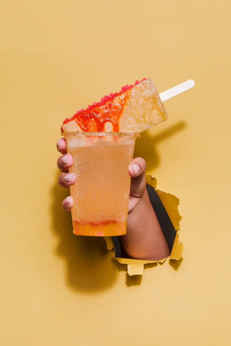 Soda IKE con una paleta frutal con topping ácido encima